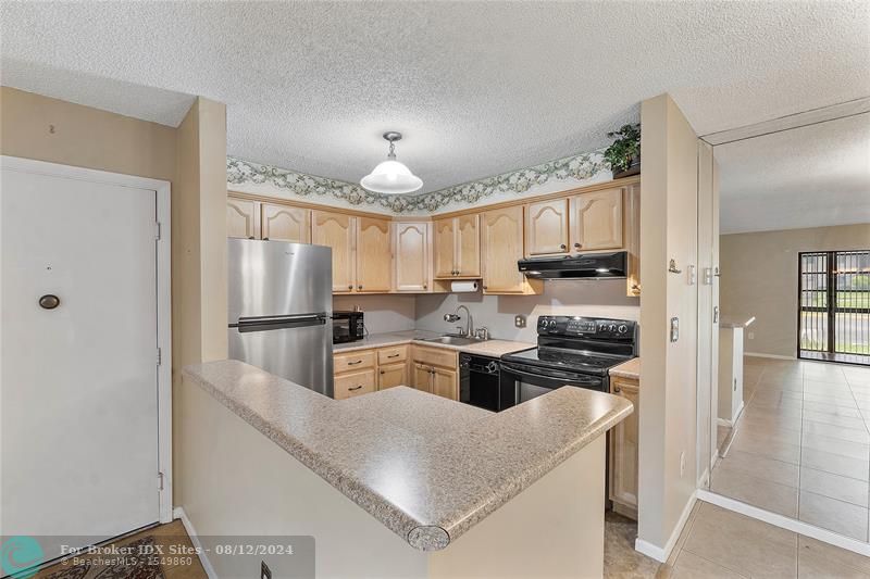 Image 11 of 25 For 9887 Belfort Cir  112