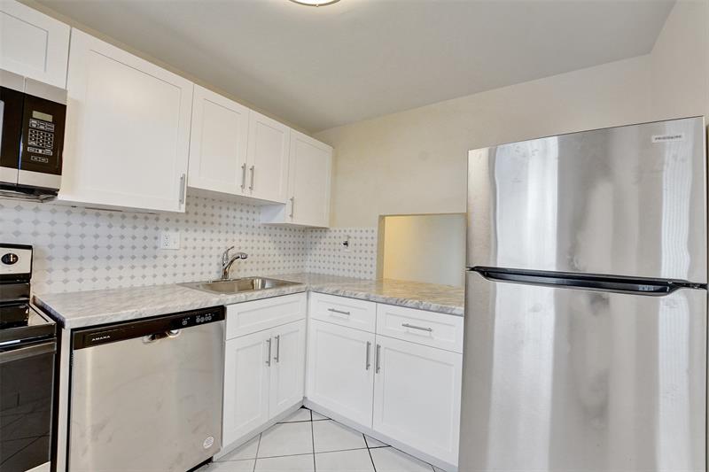 Image 10 of 75 For 7897 Golf Circle Dr  105