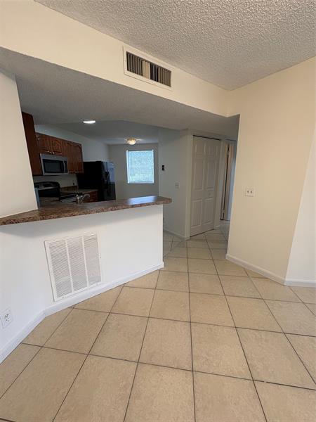 Image 13 of 40 For 9033 Wiles Rd  202