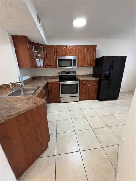 Image 15 of 40 For 9033 Wiles Rd  202