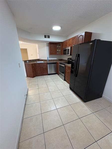 Image 17 of 40 For 9033 Wiles Rd  202