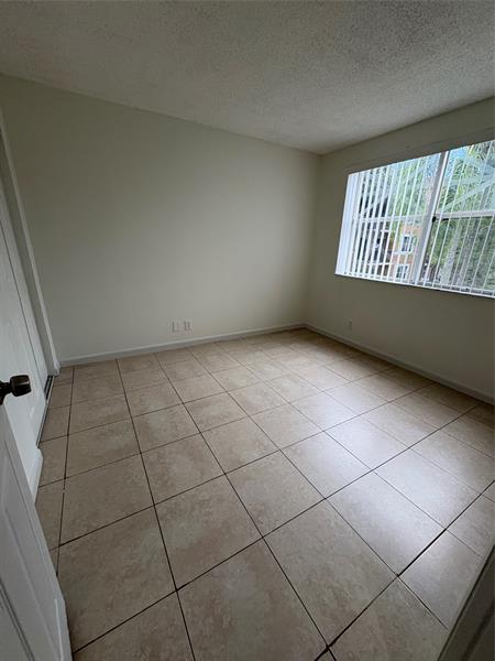 Image 22 of 40 For 9033 Wiles Rd  202