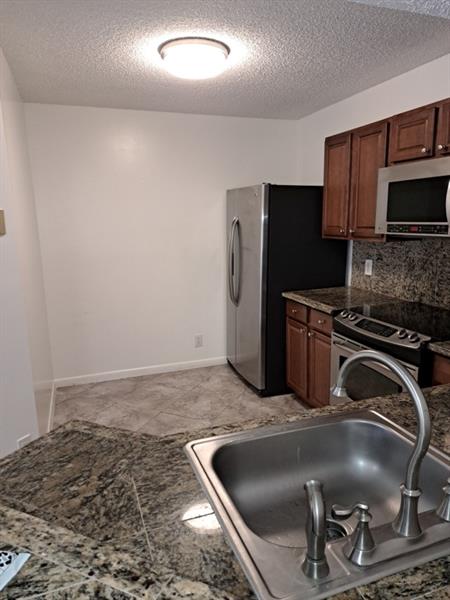 Image 16 of 28 For 8901 Wiles Rd  204