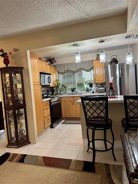 Image 10 of 38 For 9400 Lime Bay Blvd  112