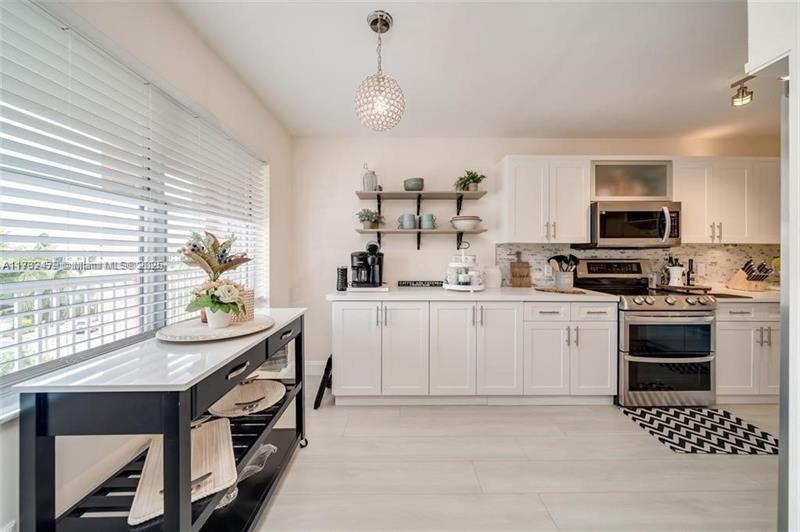 Image 5 of 22 For 2560 103rd Ave  406