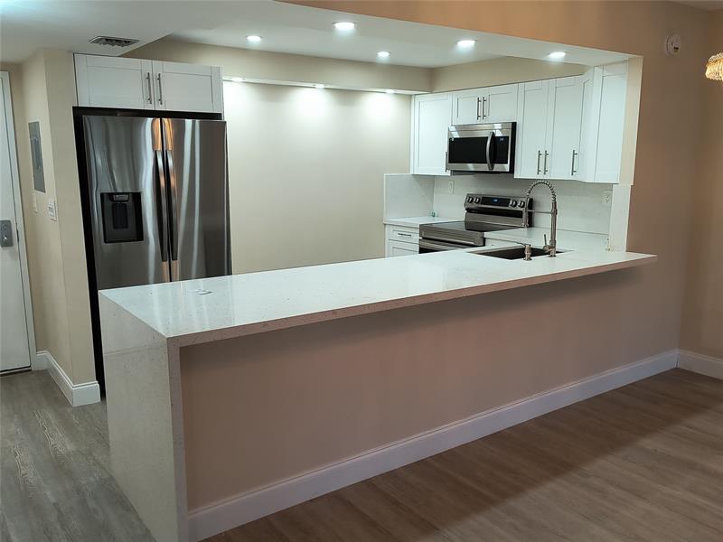 Image 4 of 24 For 10777 Sample Rd  203