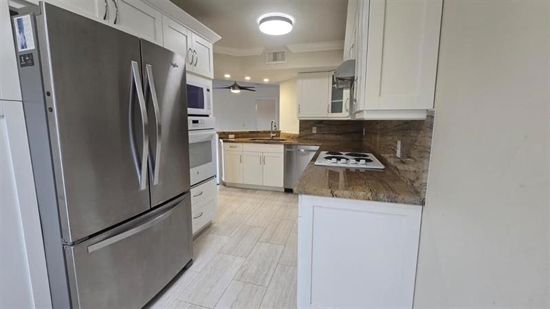 Image 11 of 33 For 8871 Wiles Road  202