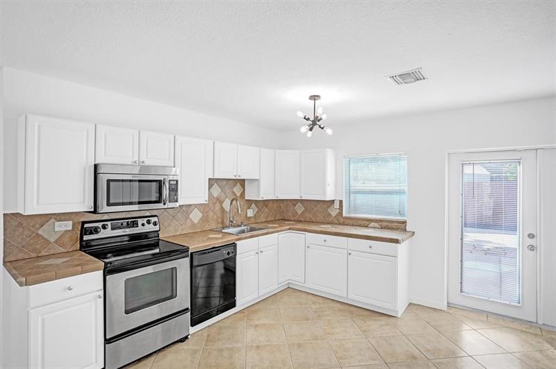 Image 8 of 31 For 651 59th Ct  