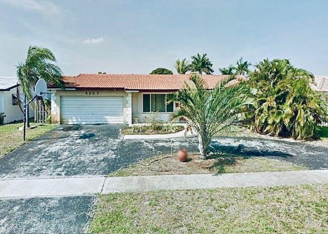 Listing Details for 5207 Roosevelt St, Hollywood, FL 33021
