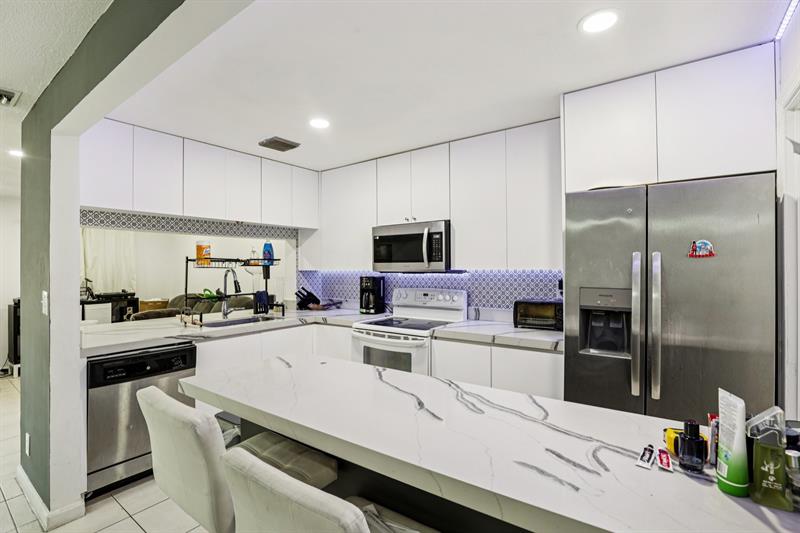 Image 11 of 35 For 5843 Woodlands Blvd  5843