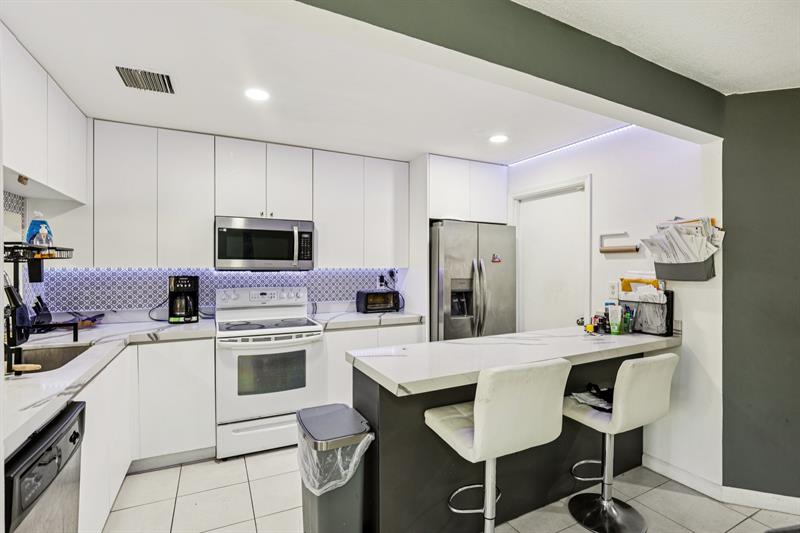 Image 12 of 35 For 5843 Woodlands Blvd  5843