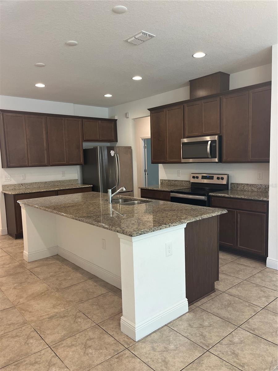 Image 4 of 26 For 14741 Milfoil Avenue