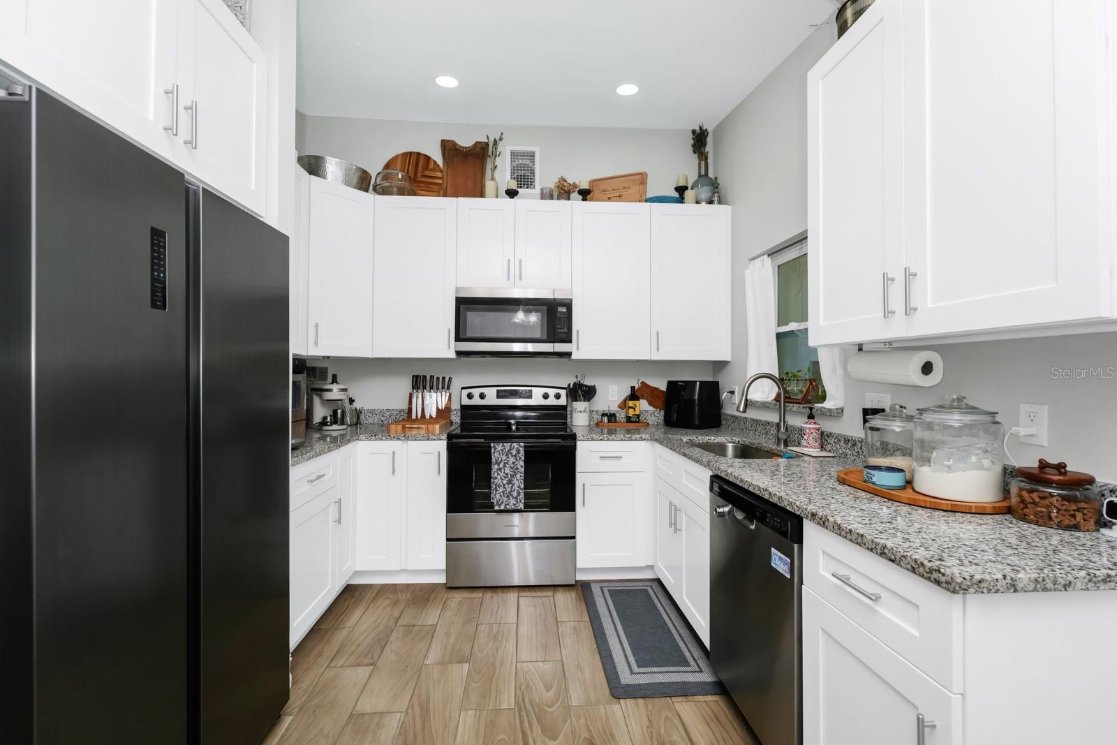 Image 13 of 43 For 7616 Simms Avenue