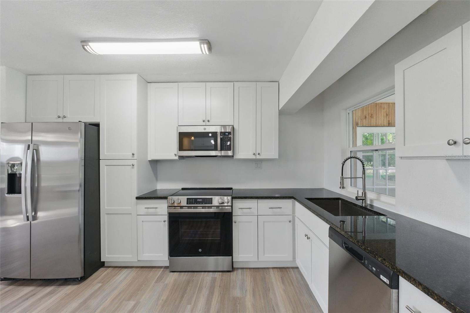 Image 14 of 59 For 8812 Oakwood Drive