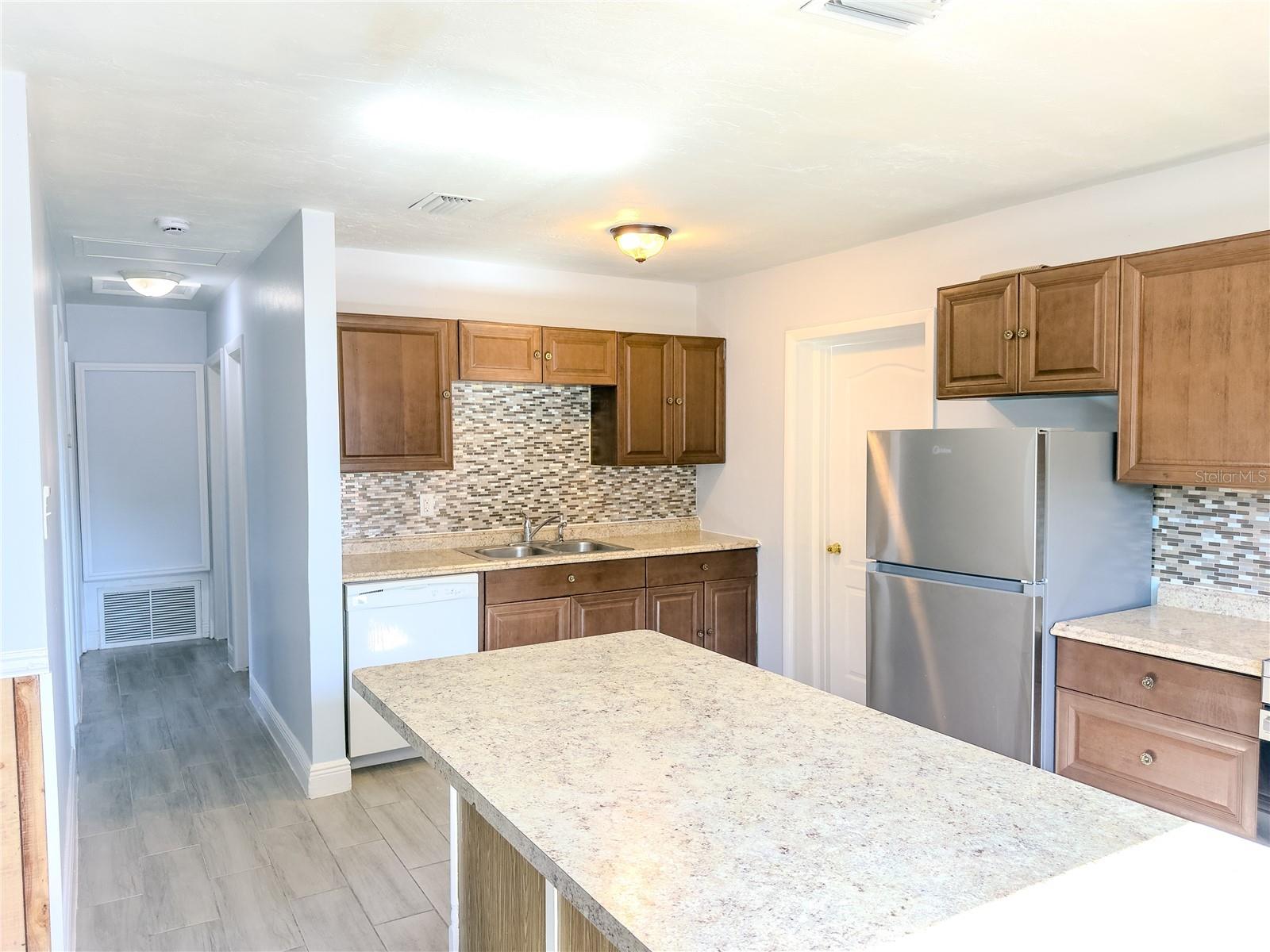 Image 12 of 42 For 7702 Arezzo Avenue