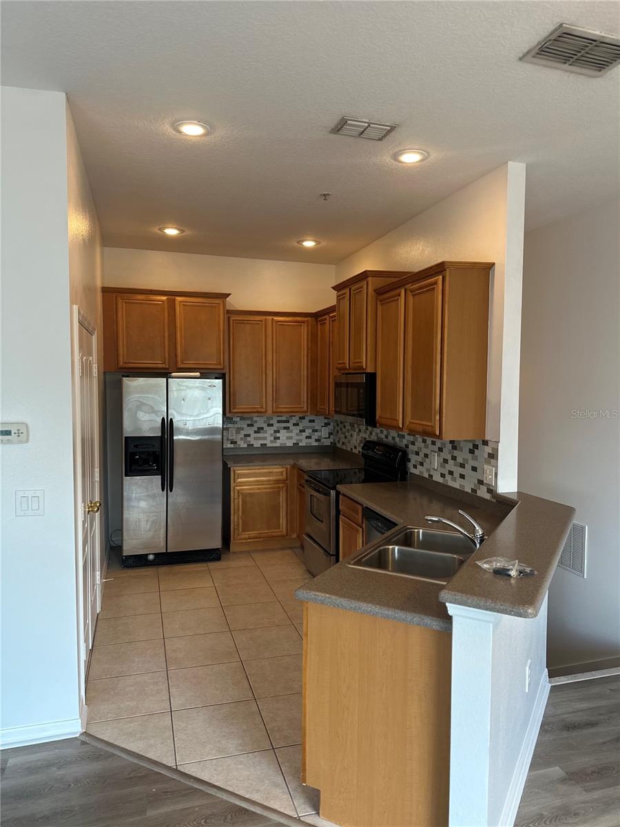 Image 6 of 27 For 6604 Goldenrod Road 100a