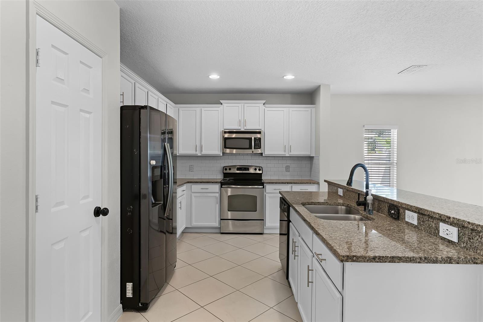 Image 4 of 45 For 10033 Stockbridge Street