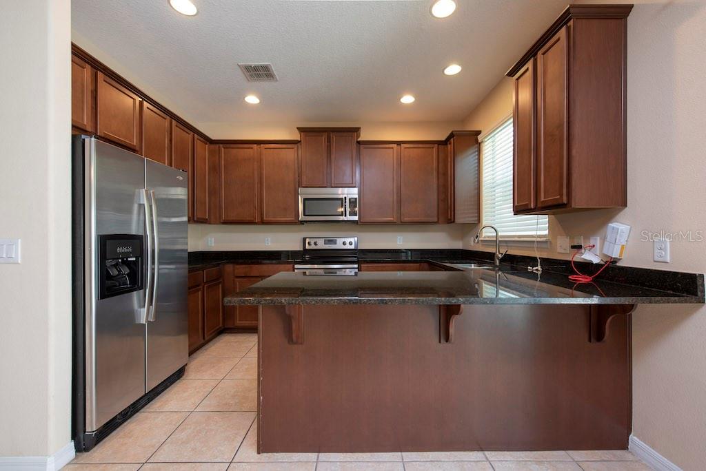 Image 5 of 35 For 9460 Tawnyberry Street