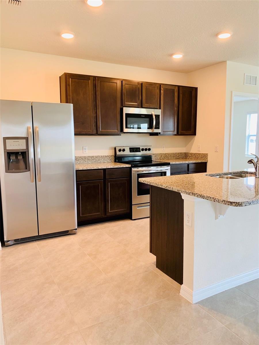 Image 5 of 25 For 9036 Tuscan Cypress Street