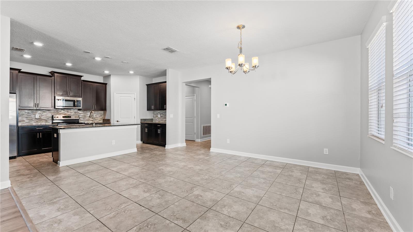 Image 12 of 38 For 9881 Magnolia Woods Boulevard