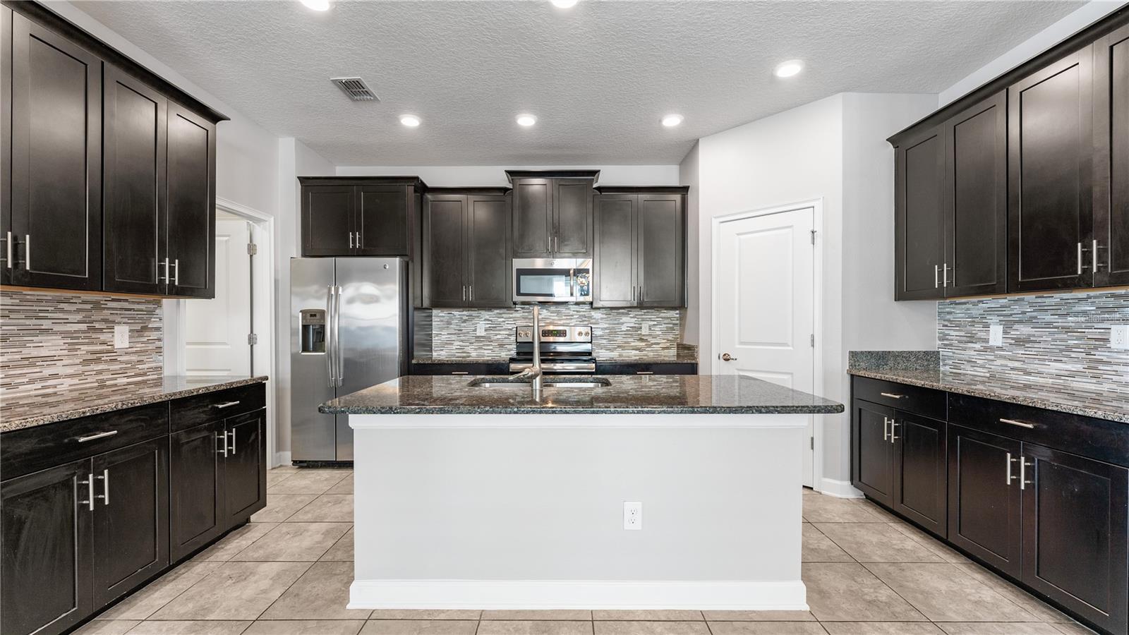 Image 6 of 38 For 9881 Magnolia Woods Boulevard