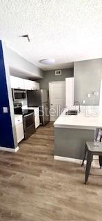 Image 6 of 9 For 5572 Metrowest Boulevard 20