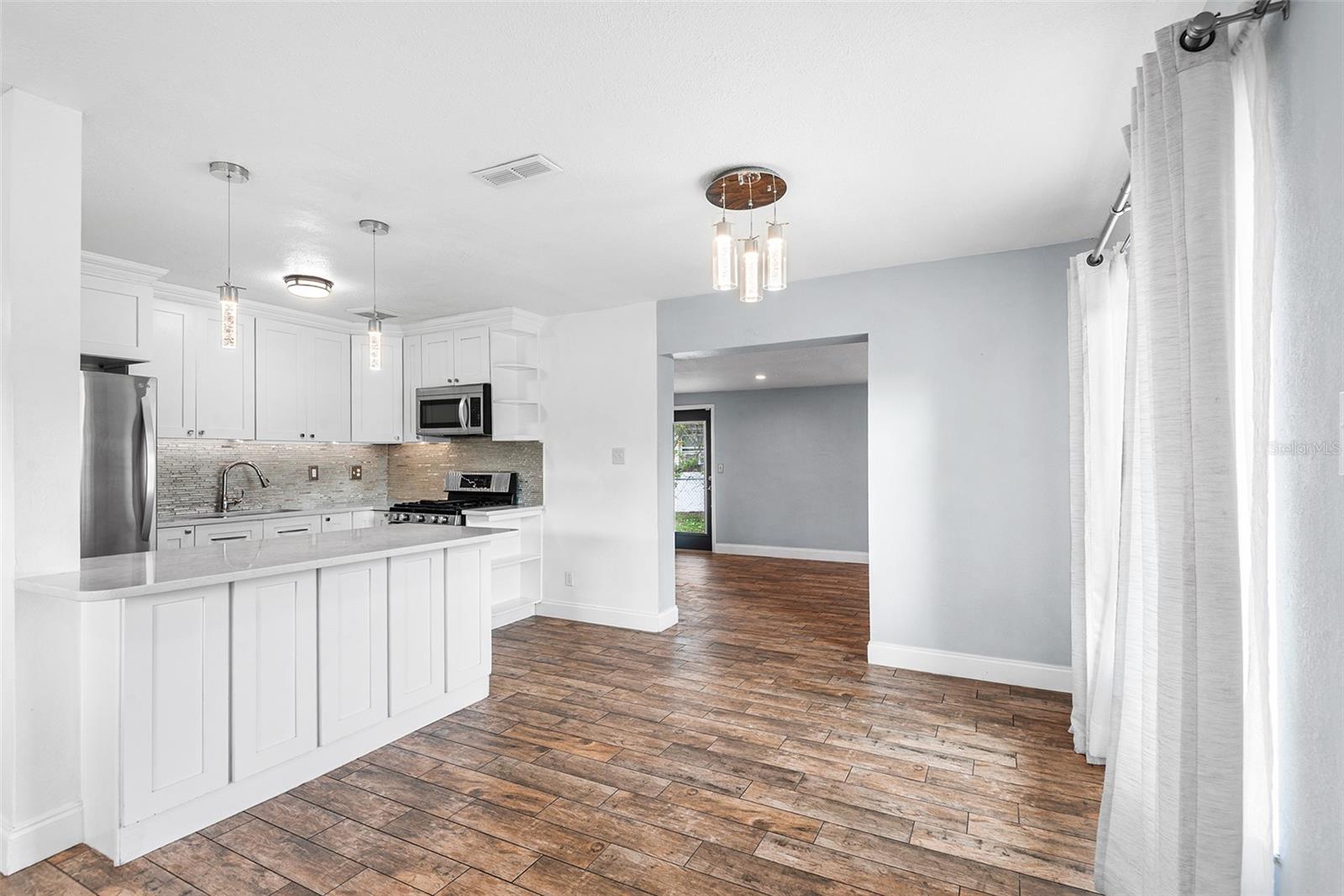 Image 4 of 28 For 7606 Cassino Avenue