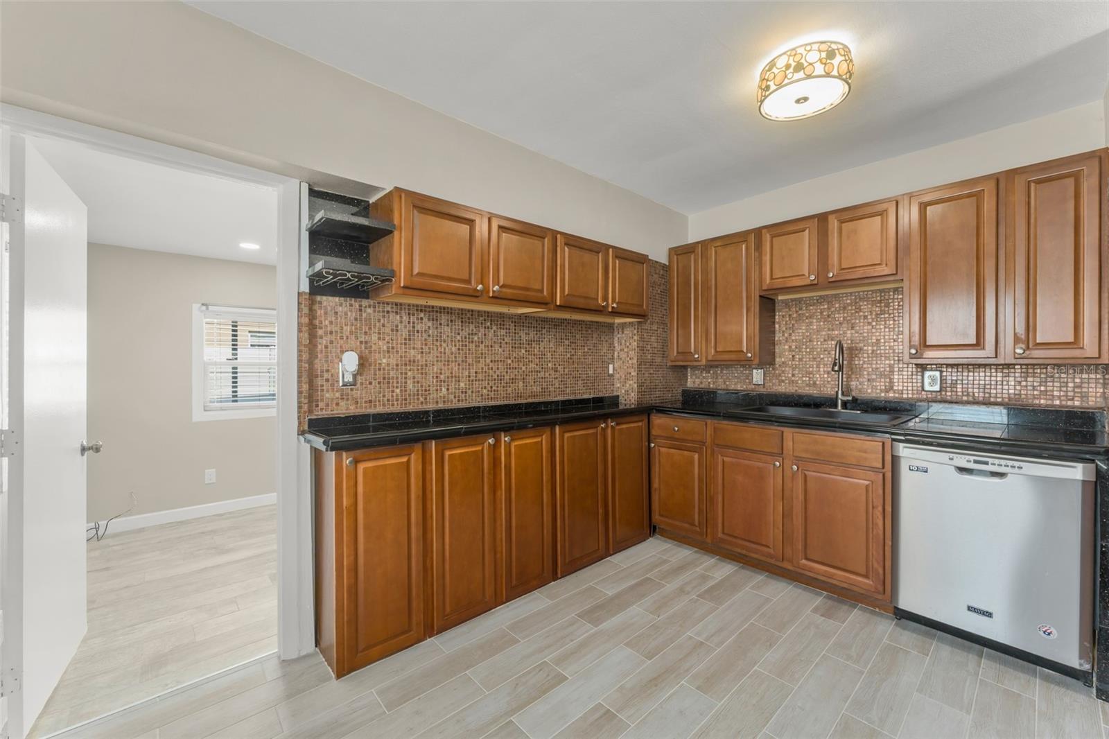 Image 7 of 32 For 7727 Perugia Avenue