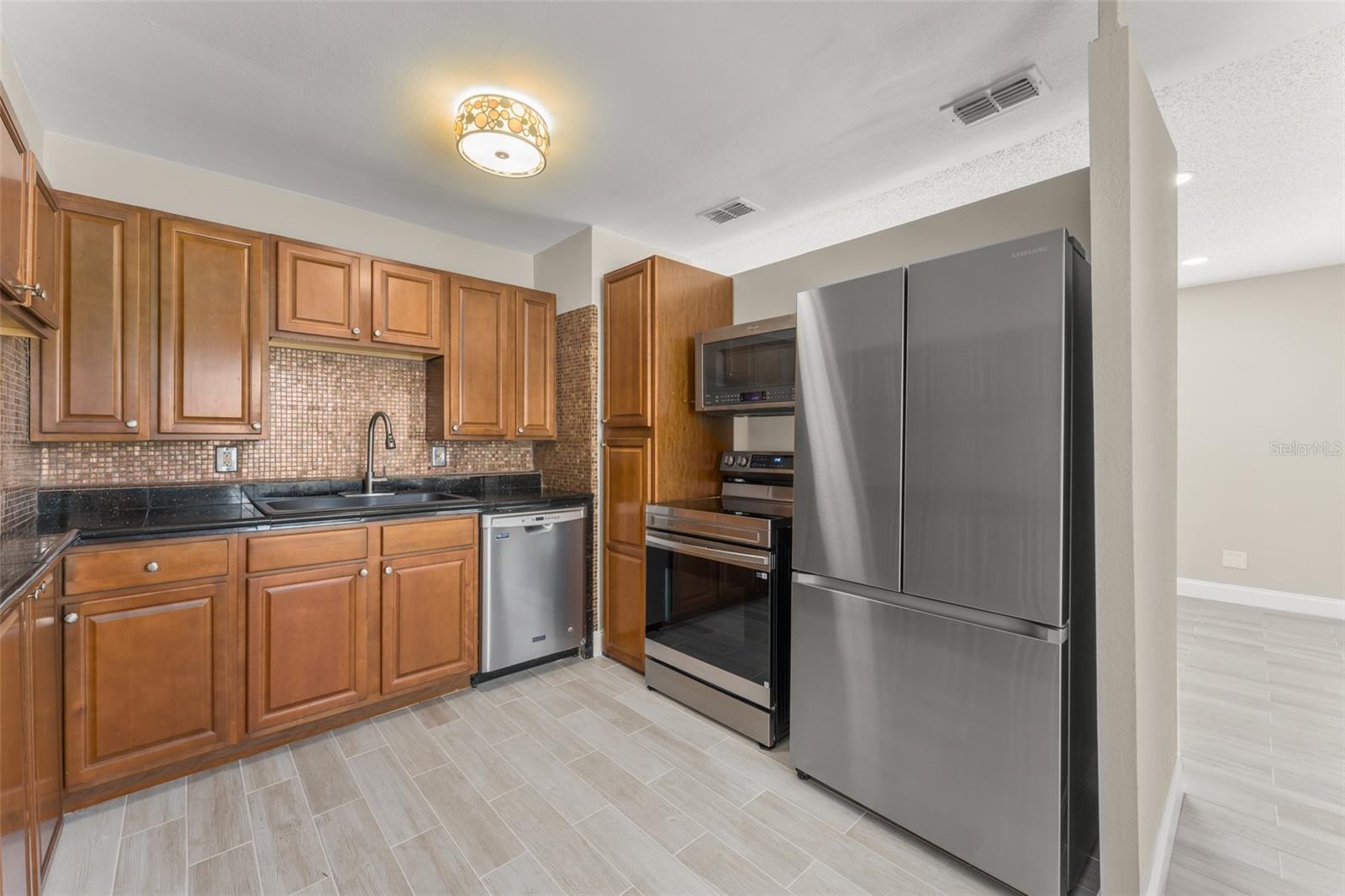 Image 8 of 32 For 7727 Perugia Avenue