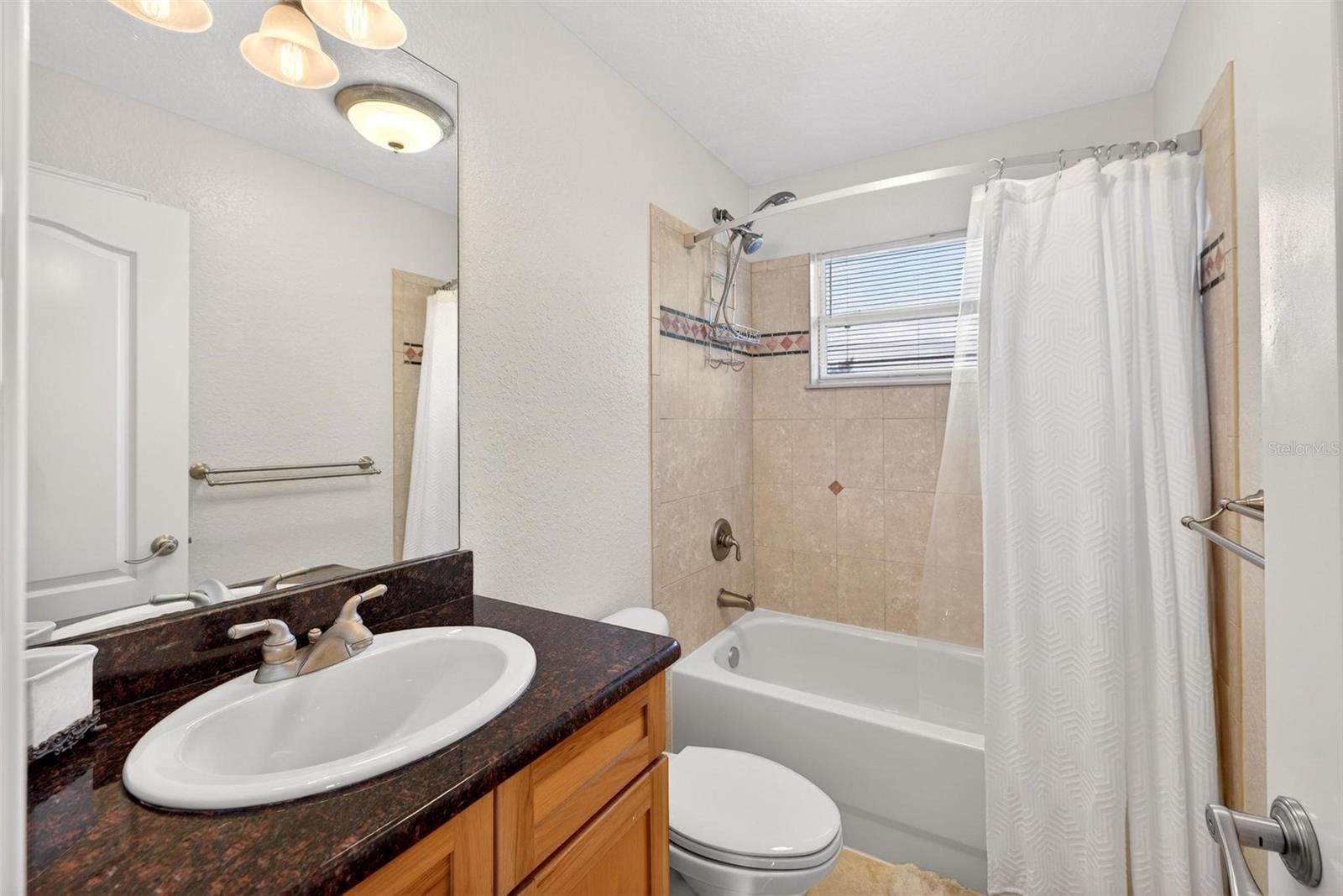 Image 17 of 40 For 20106 Sunset Landing Avenue