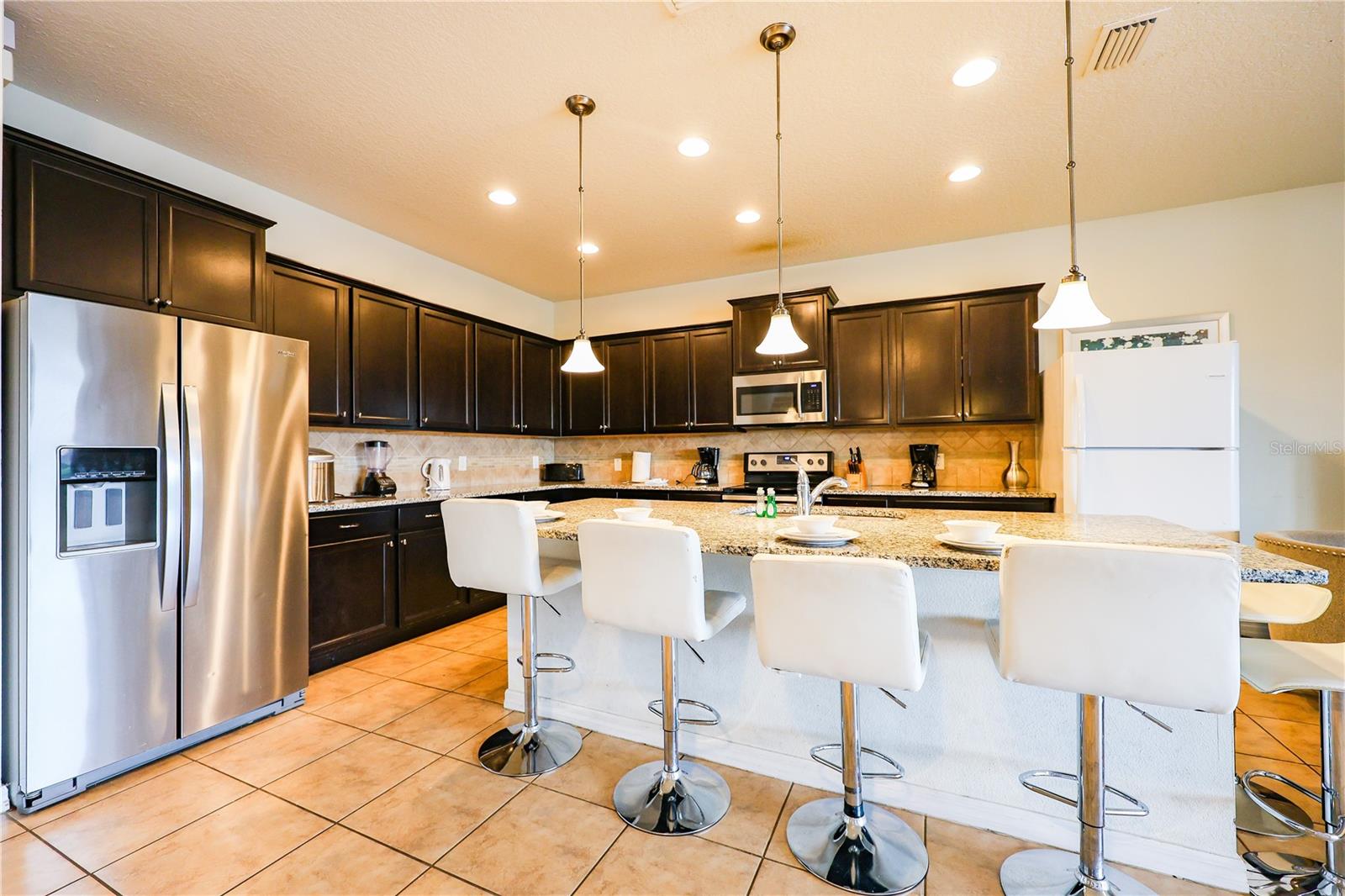 Image 4 of 88 For 8811 Macapa Drive