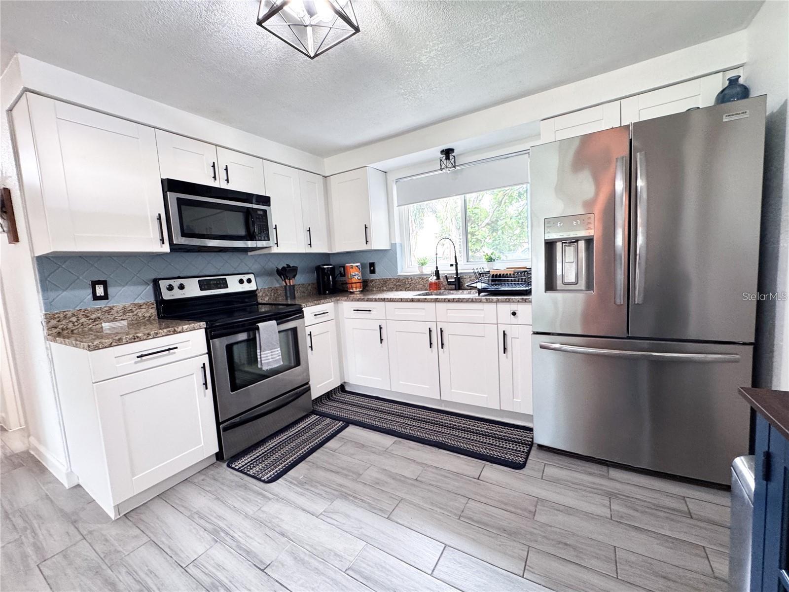 Image 4 of 29 For 9616 Pine Ridge Avenue