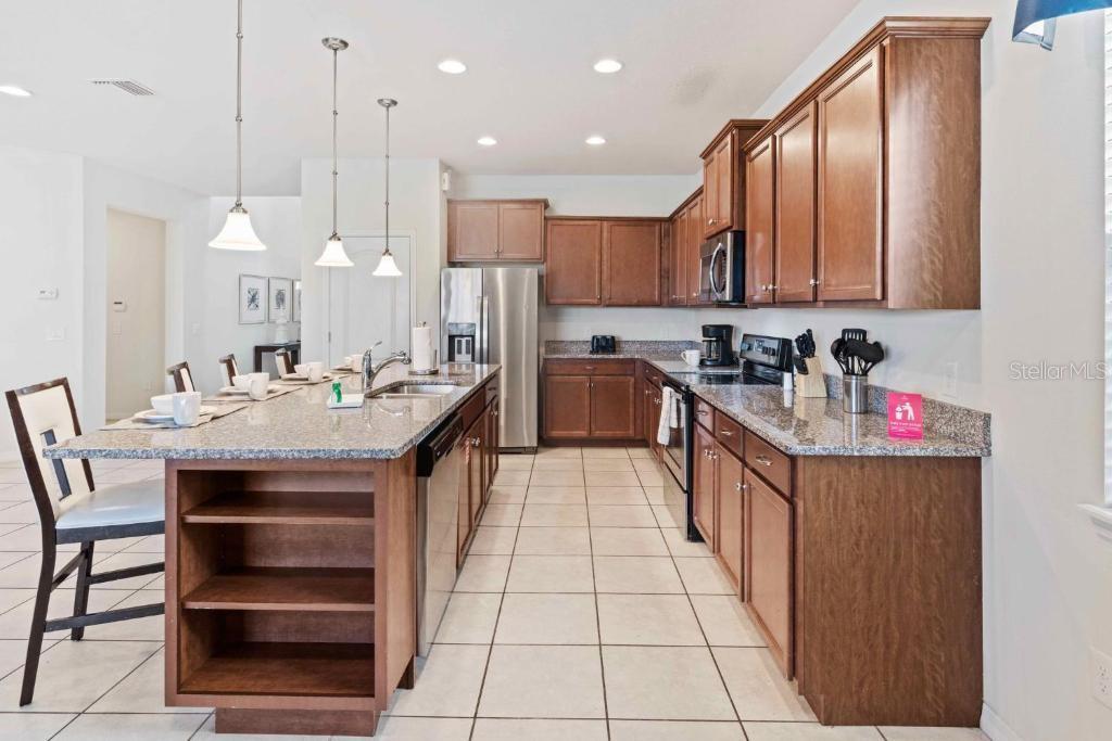 Image 7 of 65 For 8815 Macapa Drive