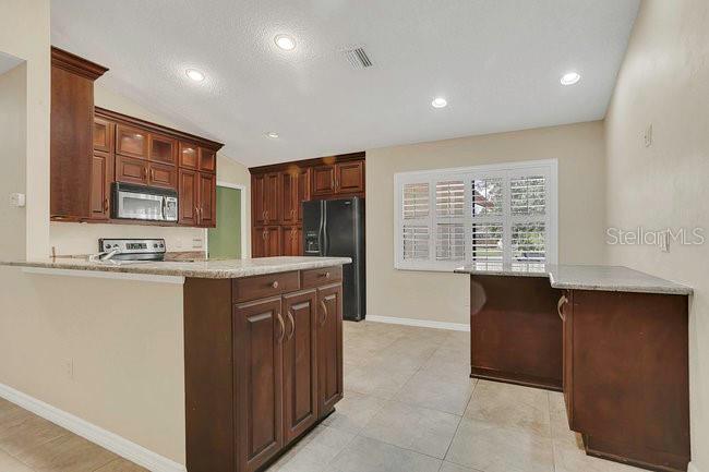 Image 11 of 41 For 9319 Woodbreeze Boulevard