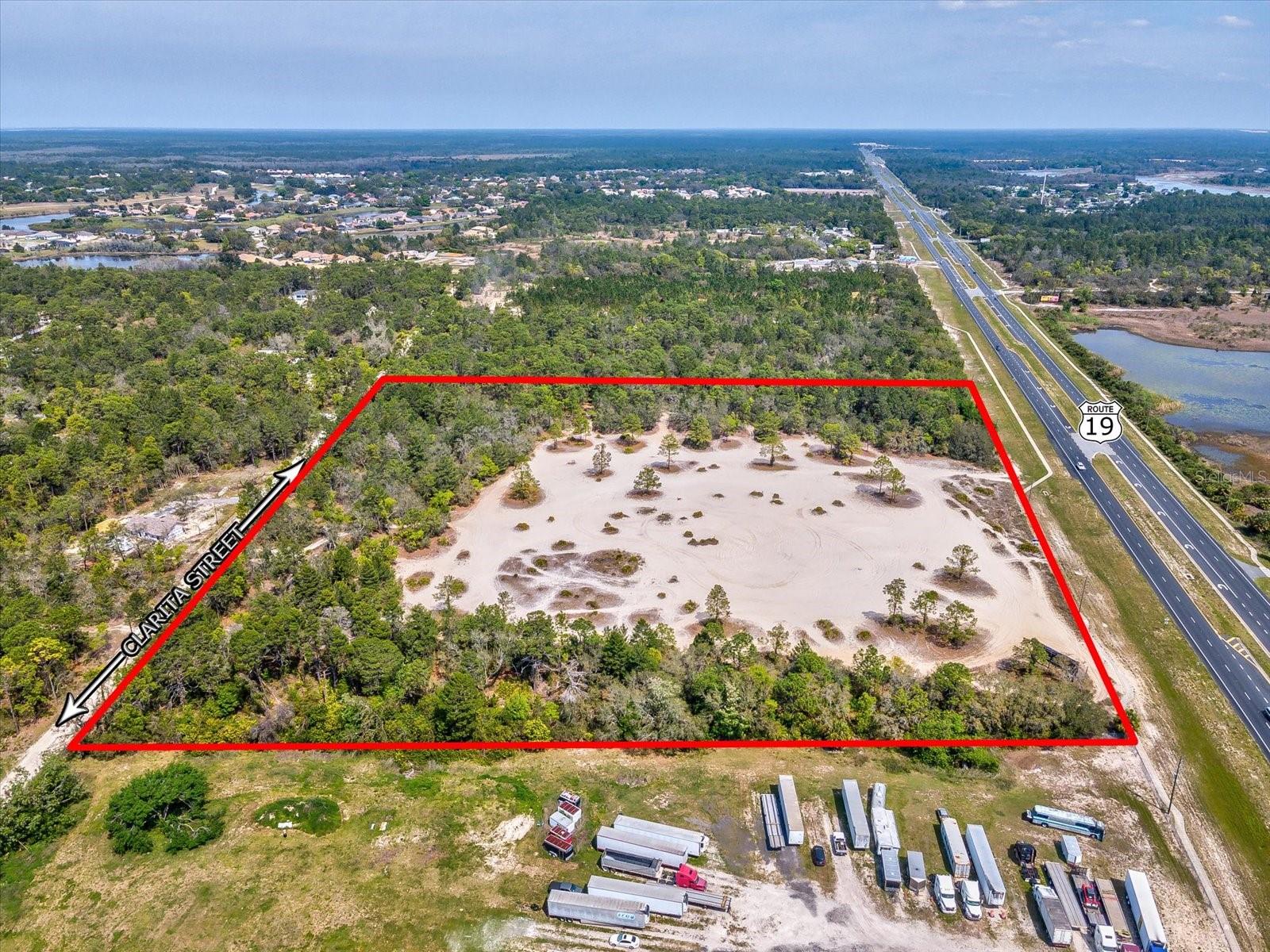 Listing photo id 0 for 15.7 Acres Commercial Way