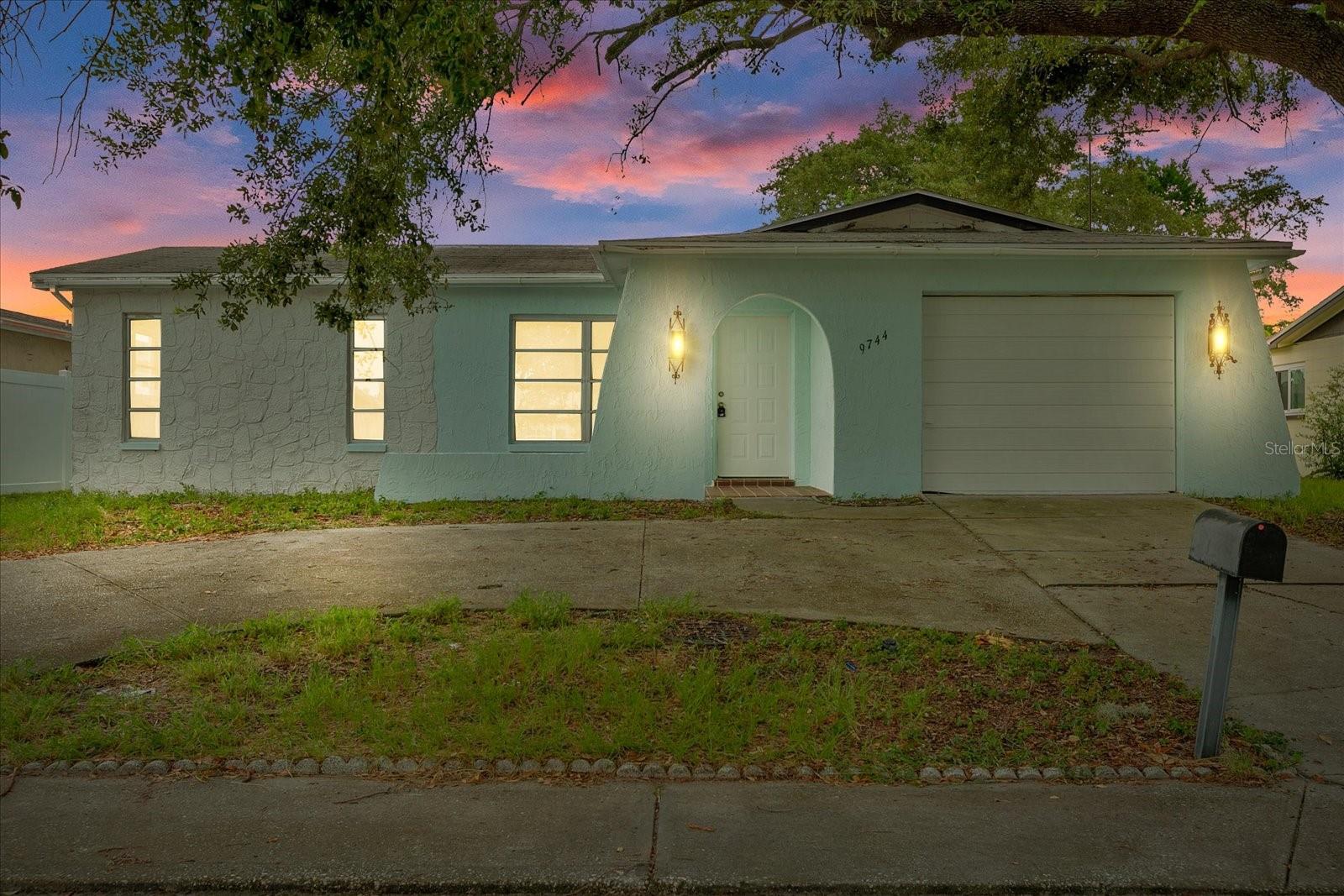 Listing photo id 0 for 9744 Rainelle Lane