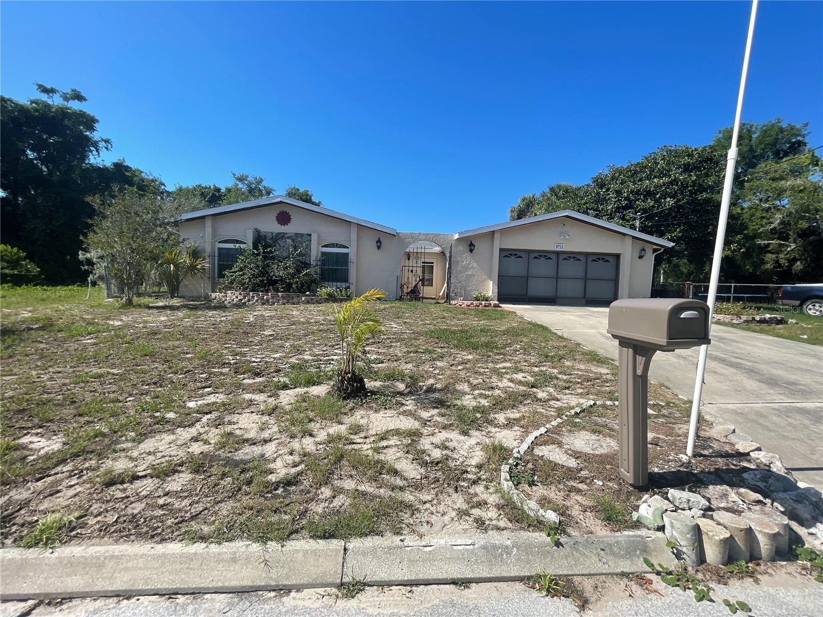 Listing photo id 0 for 8711 Jolly Roger Drive