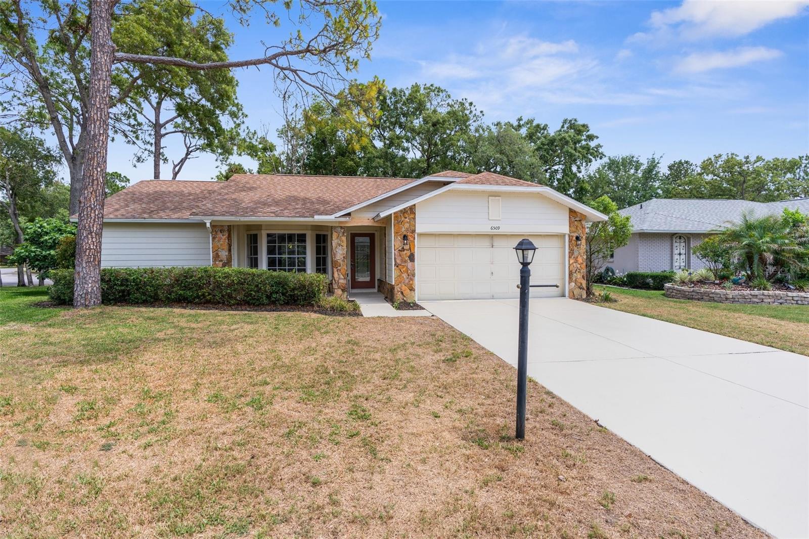 Image 21 of 26 For 6509 Pine Meadows Drive
