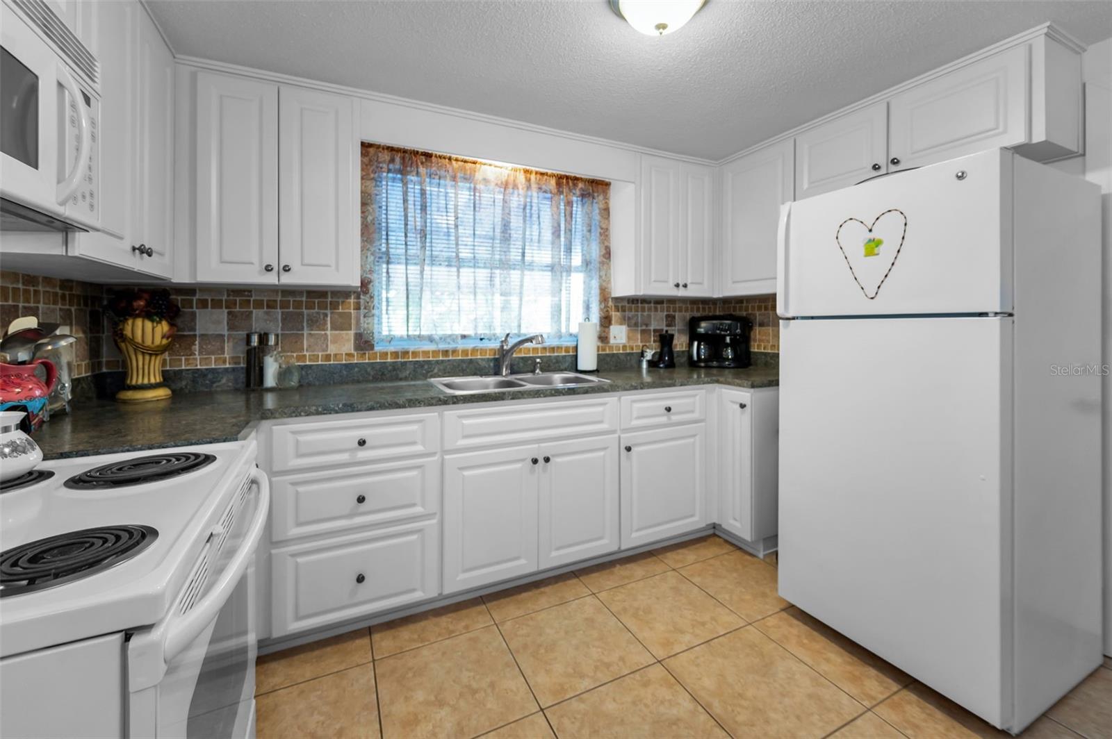 Image 18 of 56 For 7735 Canna Drive