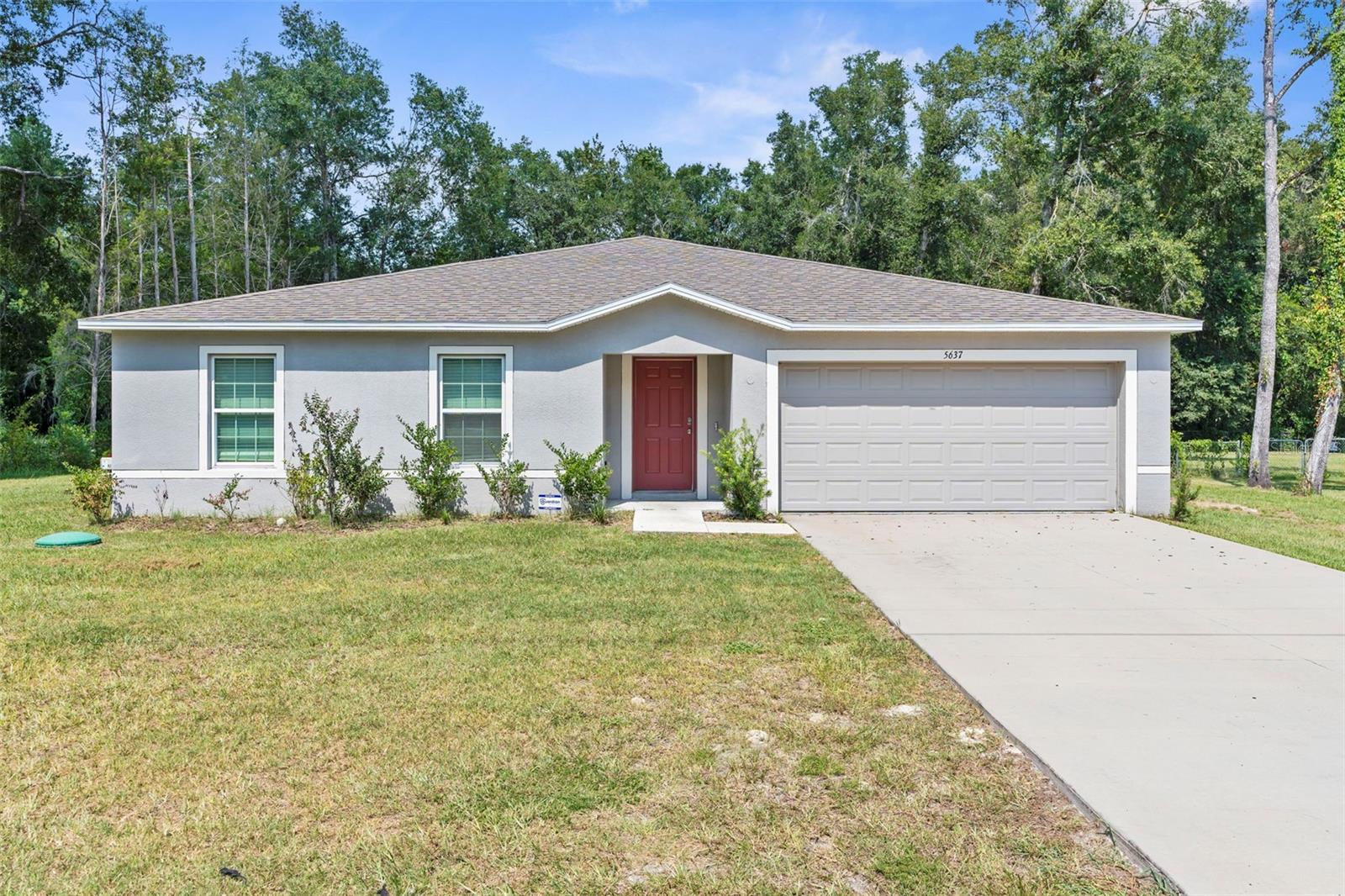 Listing photo id 0 for 5637 Tangelo Lane