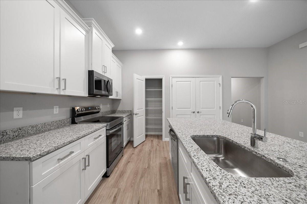 Image 14 of 46 For 6528 140th Pl. Rd.