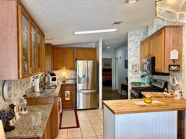 Image 9 of 25 For 6239 Knotty Pine Drive Se