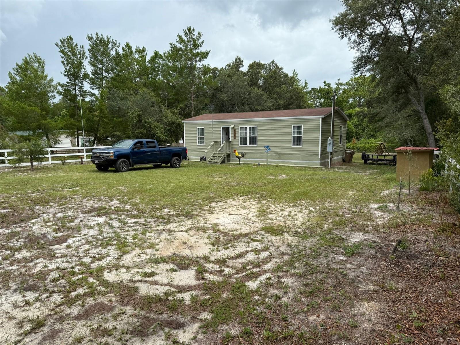 Listing photo id 0 for 31047 Scrub Oak Lane