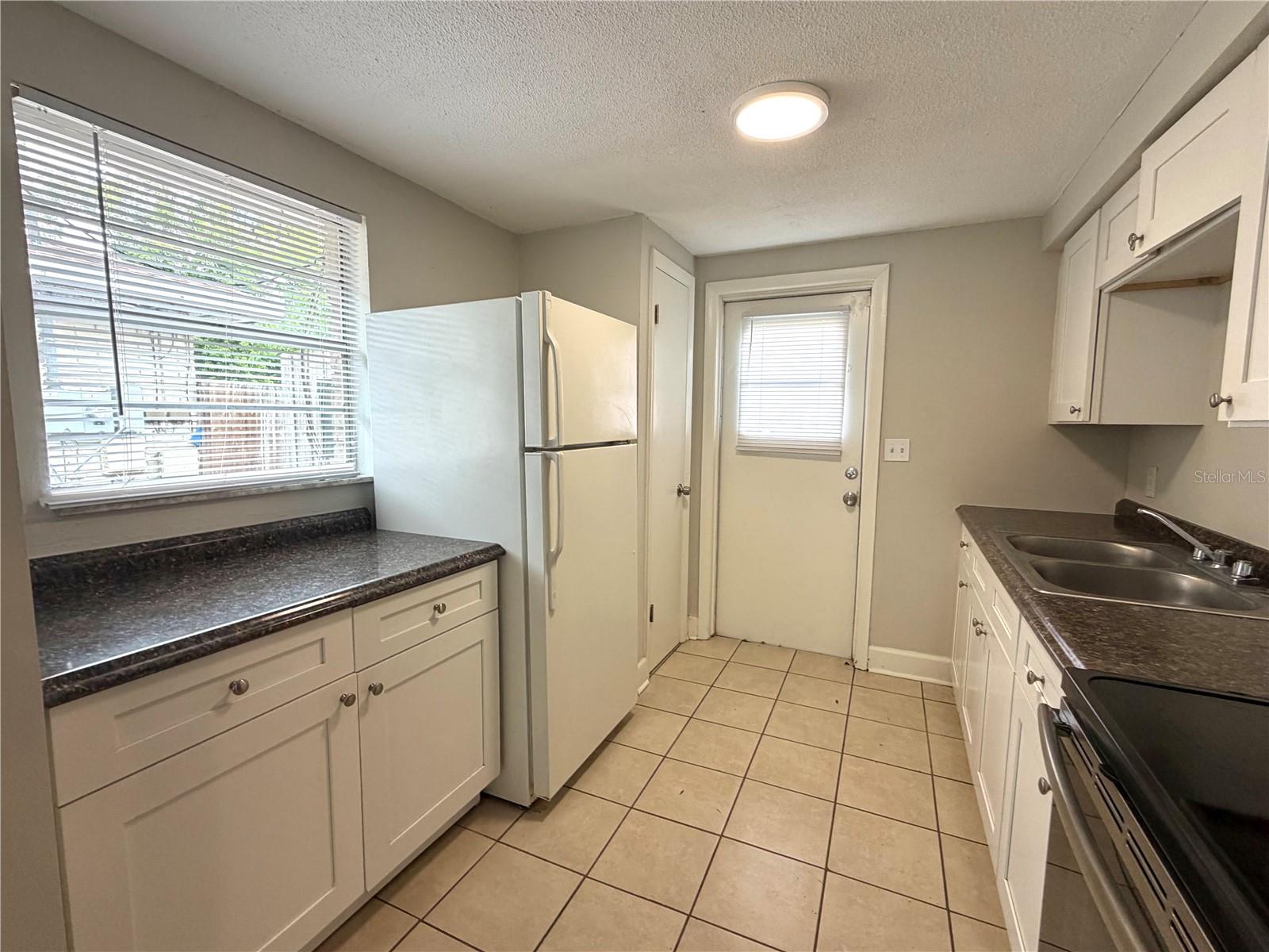 Image 4 of 9 For 10022 Wilder Avenue 12