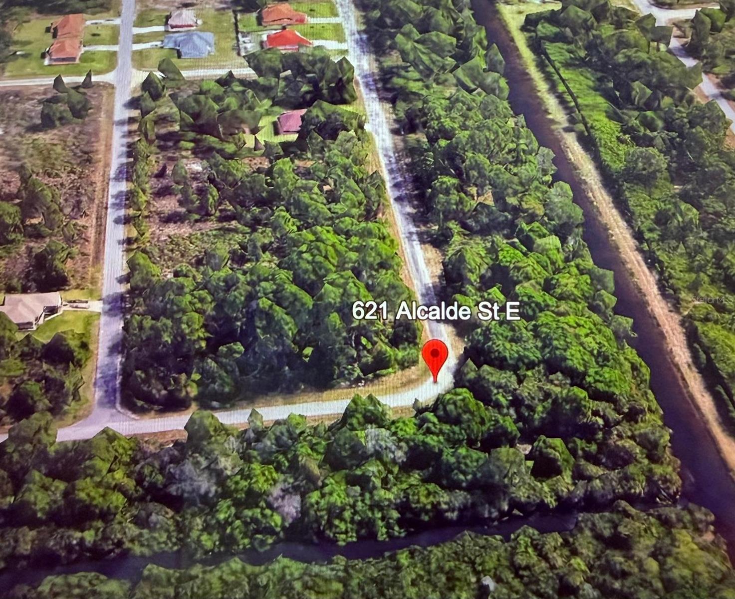 Listing Details for 921 Alcalde Street E, LEHIGH ACRES, FL 33974