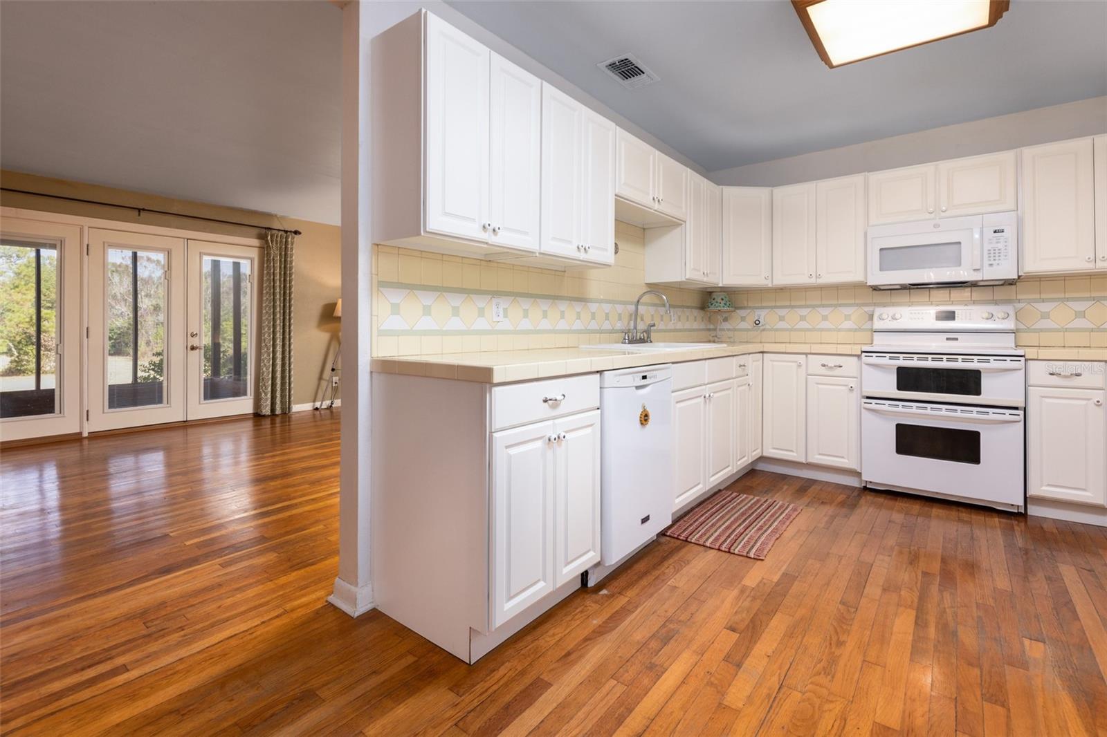 Image 8 of 44 For 7915 Breezy Point Road W