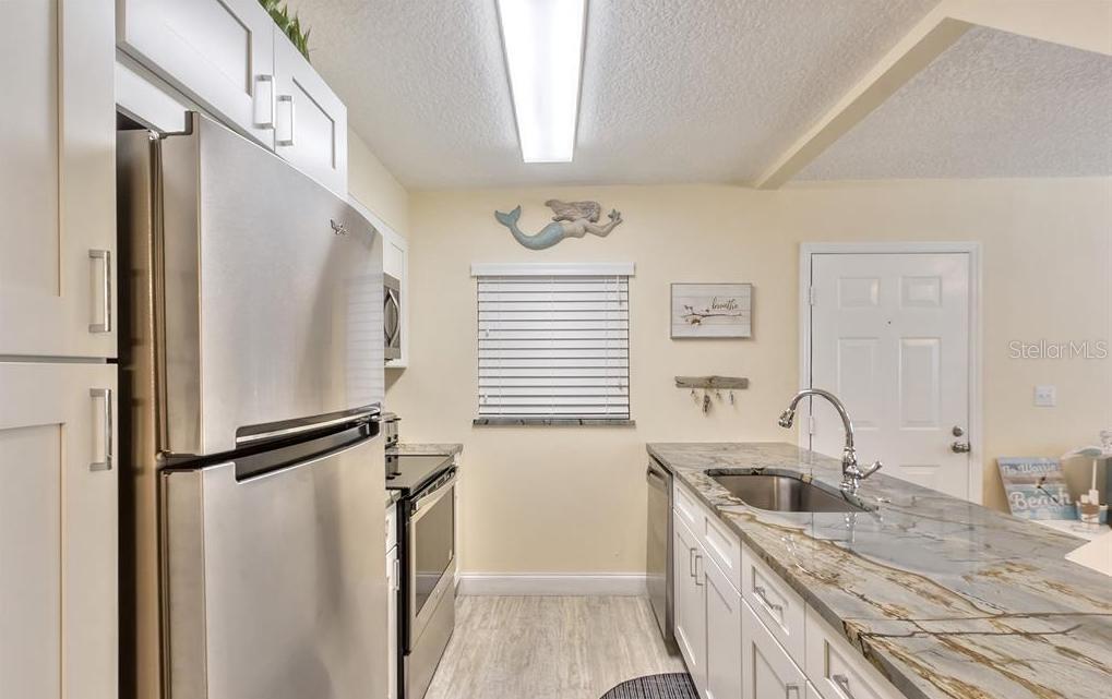 Image 8 of 19 For 4870 Atlantic Avenue 103