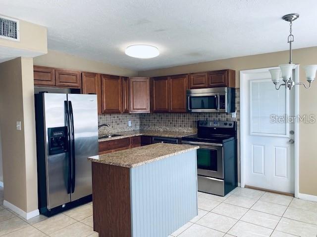 Image 4 of 28 For 8233 Portulaca Avenue