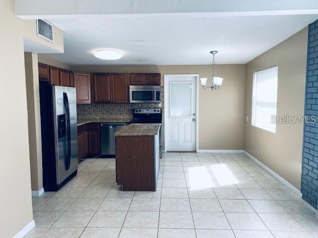Image 6 of 28 For 8233 Portulaca Avenue