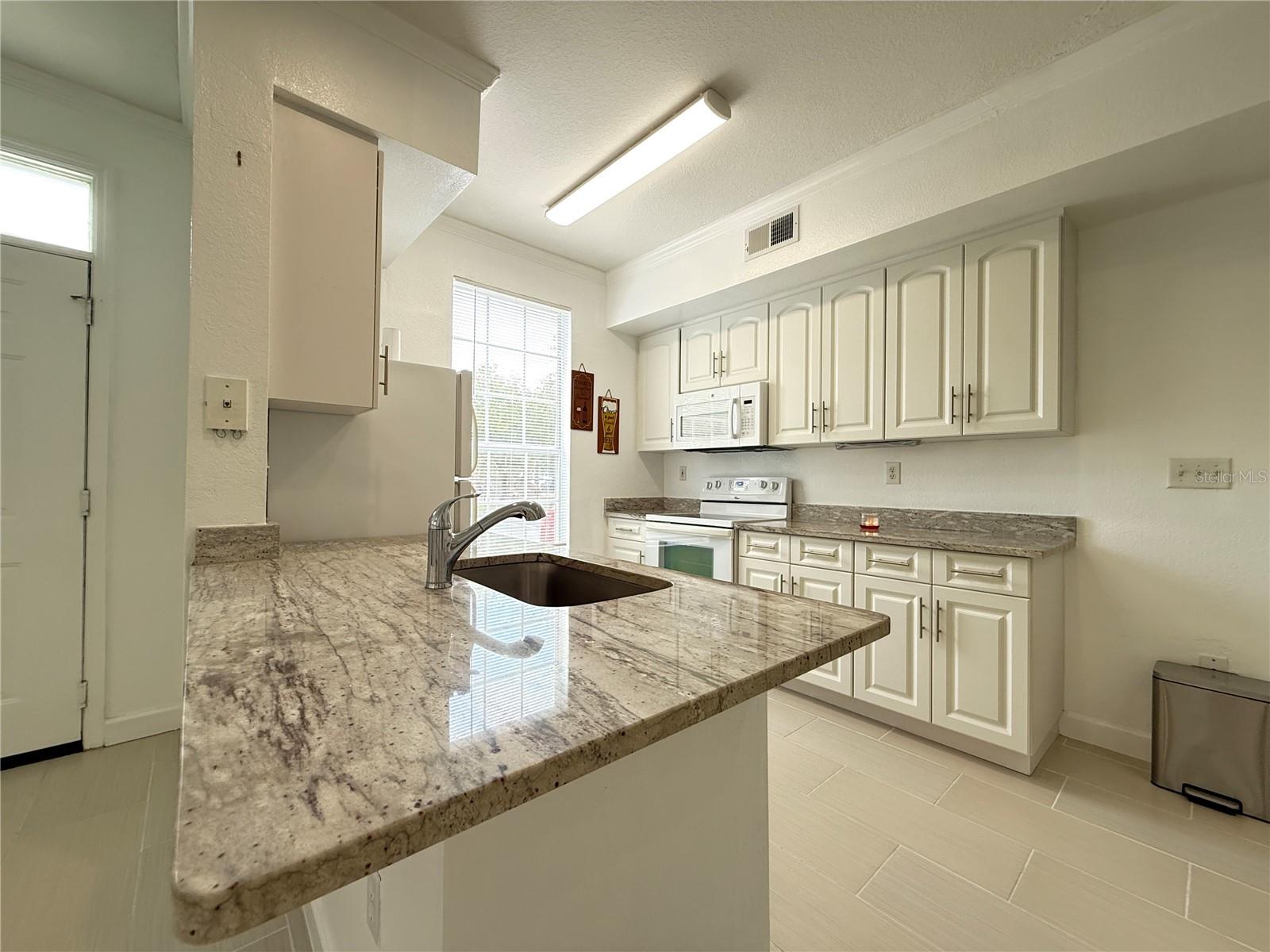 Image 2 of 25 For 9650 Lake Chase Island Way 9650